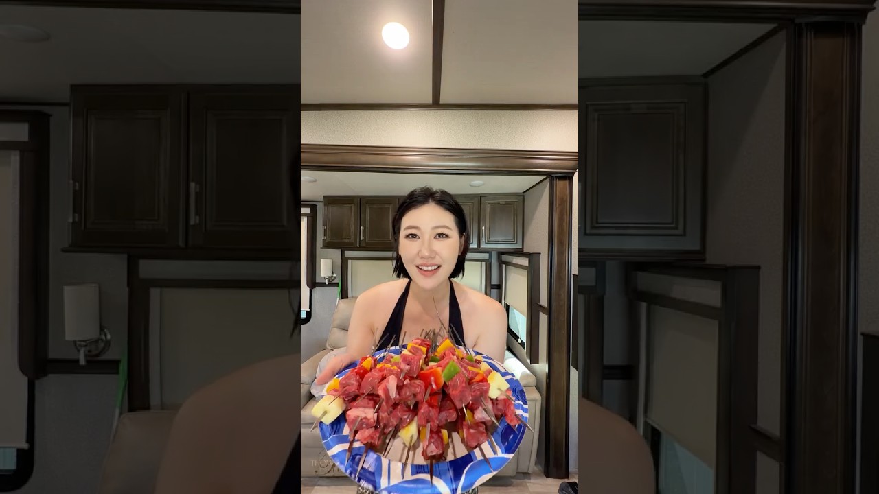 Susu preparing a Sunday BBQ in the RV